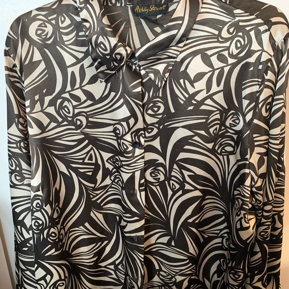 Ashley Stewart blouse with extra long sleeves. Feels like satin.
